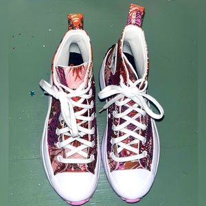 Platform pink, black, and red Converse women’s size 7.5.